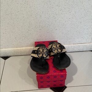 Tory Burch Black Sandals with Silver Emblem